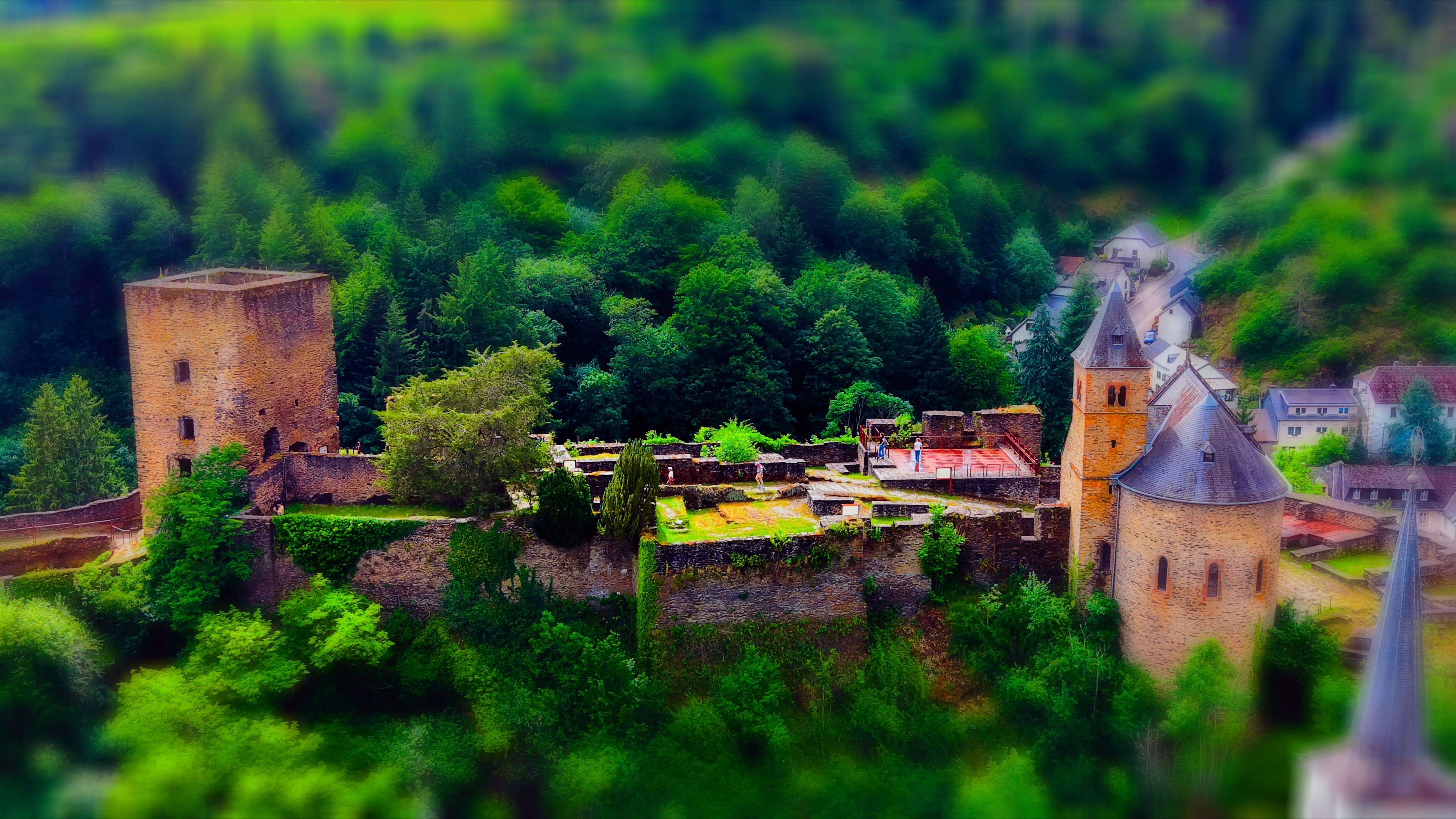 The castle ruins of Esch-sur-Sûre from a side angle