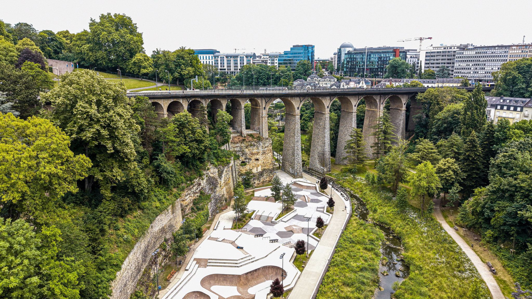 The Passerelle viaduct with the skate park below — 24 arches over a modern recreation space
